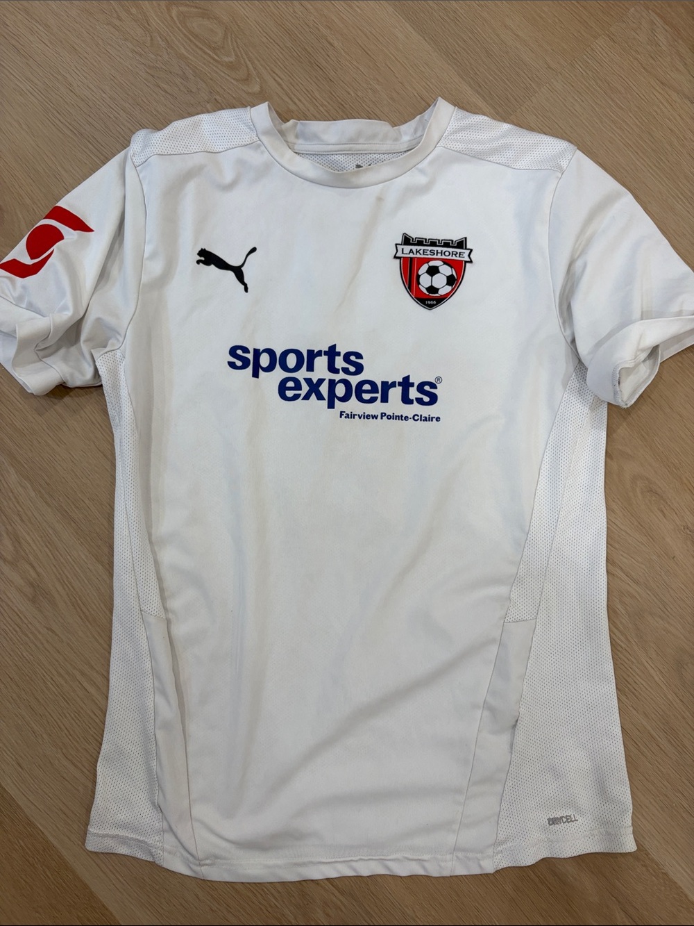 Puma Kids White Soccer Jersey with Red and Black Crest